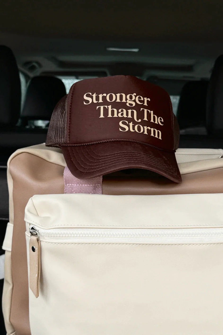 Stronger Than The Storm Trucker Hat