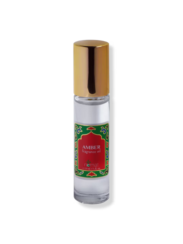 Amber fragrance oil bottle with gold cap 