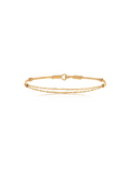 Gold bracelet on a white background