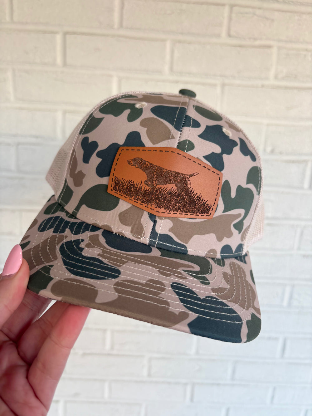 Camo hat with mesh back and leather bird dog pointer patch 