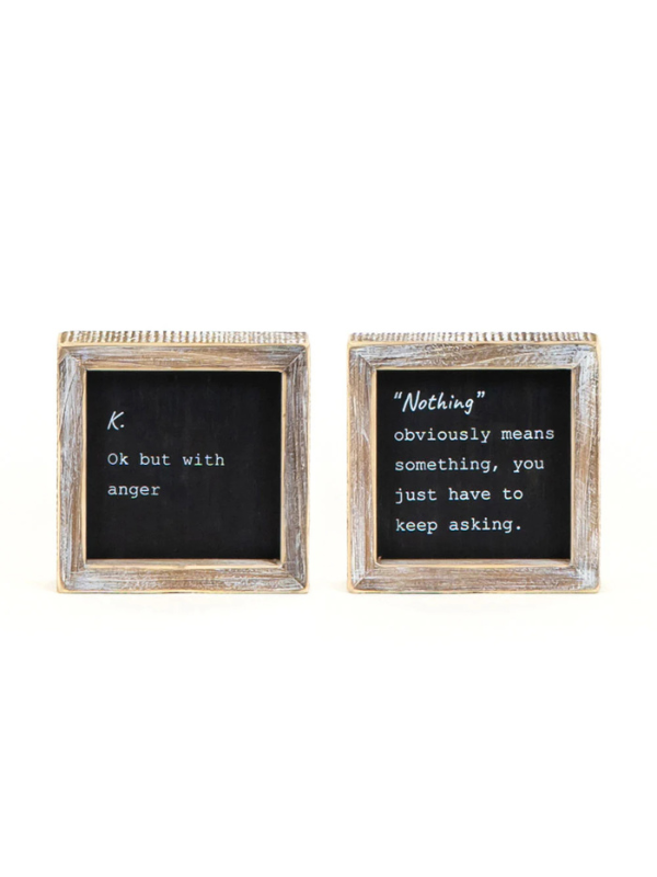 K. with Anger/Nothing Means Something Sign