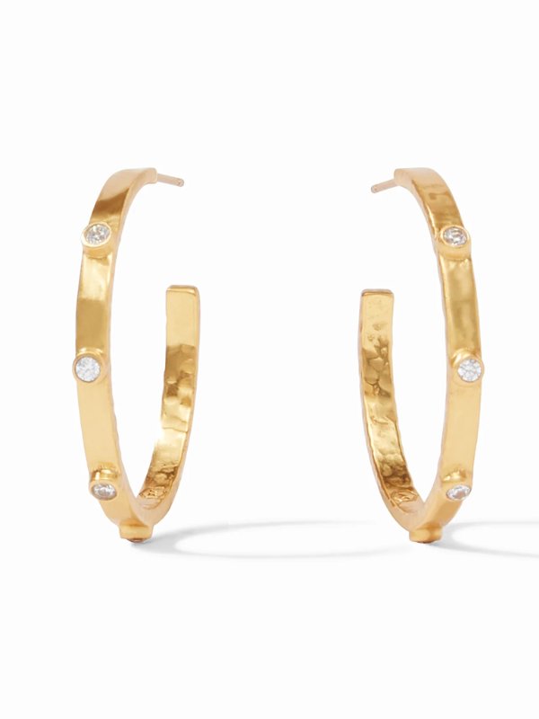Gold hoop earrings with small diamonds on a white background