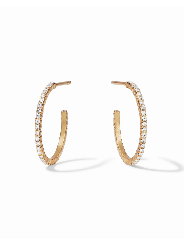 Gold hoop earrings with embedded diamonds on a white background