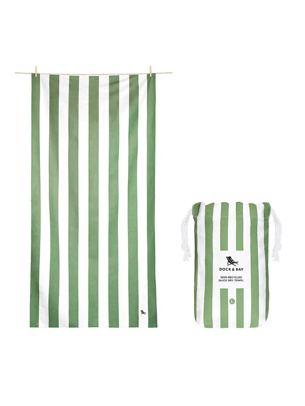 Green and white striped towel with a matching bag