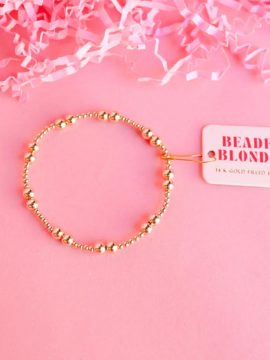 A gold-filled beaded bracelet with bigger accent beads