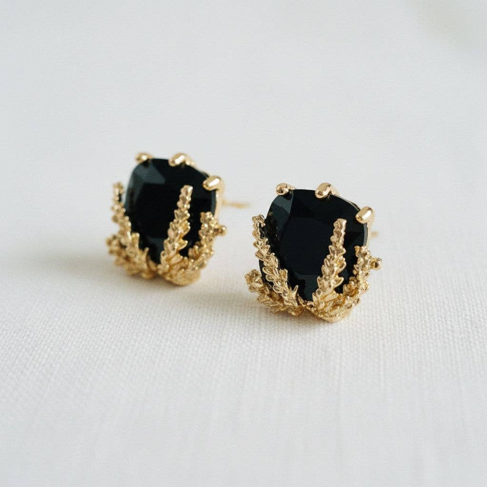 Black and gold drop stud earrings with gold detailing