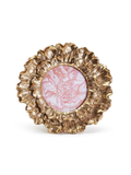 Decorative gold frame with a pink floral design on a white background