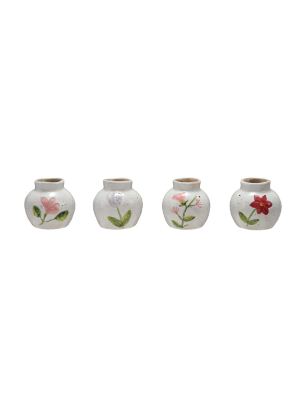 Four ceramic floral vase with flowers on it 