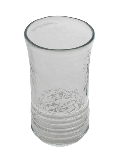 Clear glass with textured design on a white background
