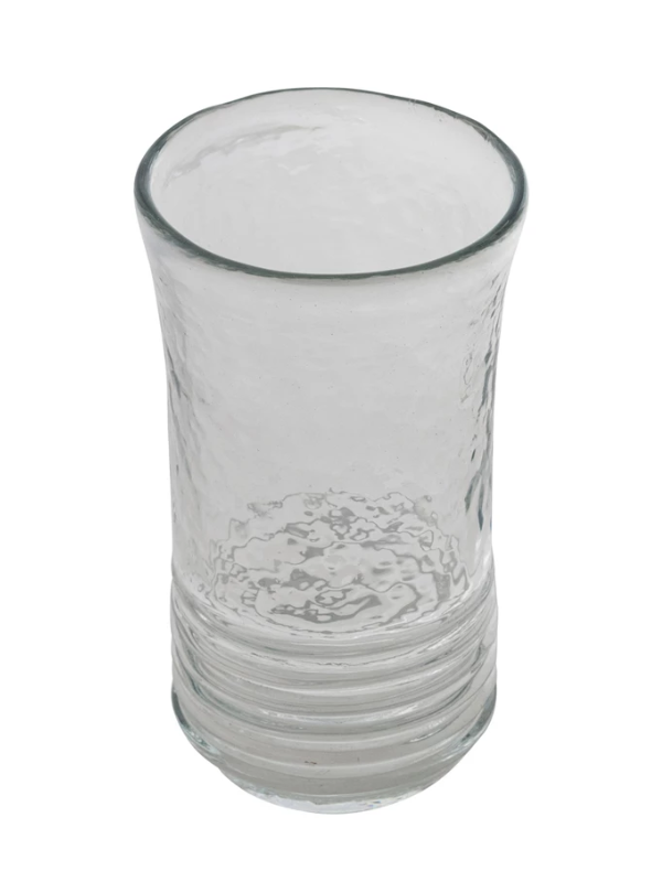 Clear glass with textured design on a white background