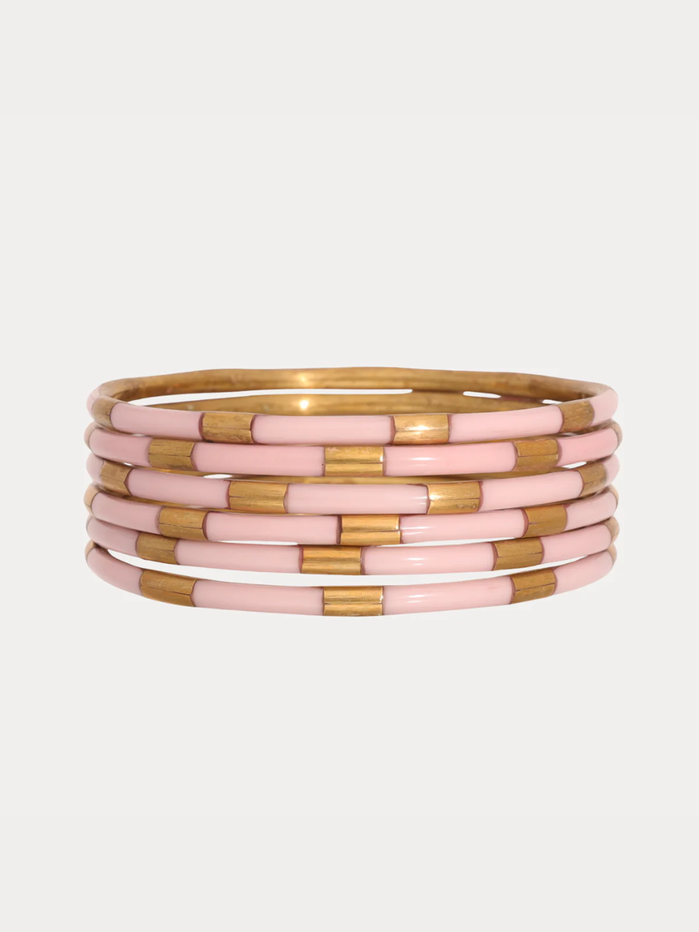 Ice Rose Veda Bangles set of six in soft blush pink stacked together.