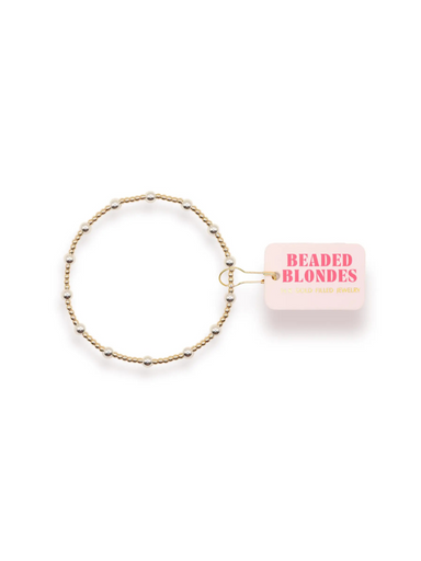 A gold-filled beaded bracelet with silver accent beads
