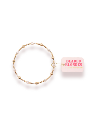 A gold-filled gold beaded bracelet with alternating pearl beads 