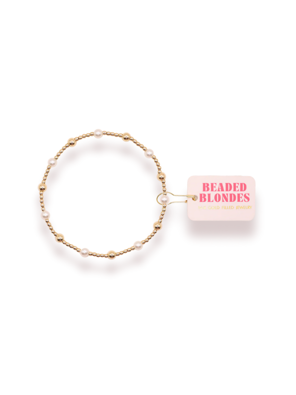 A gold-filled gold beaded bracelet with alternating pearl beads 