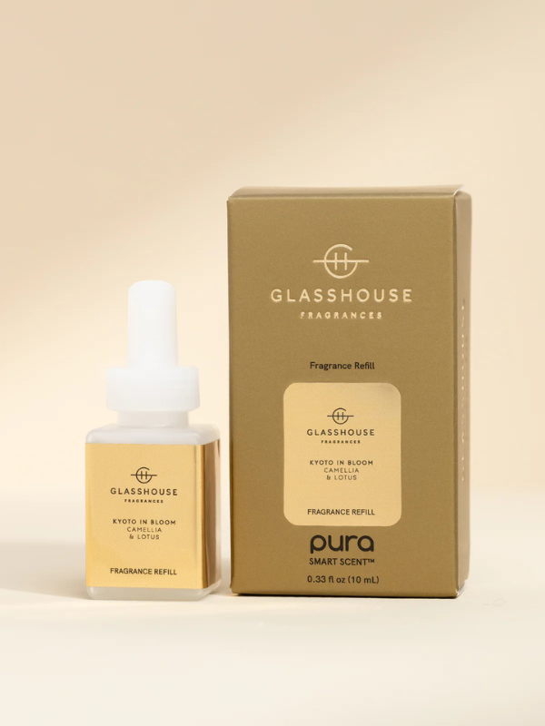 Pura scent with notes of fresh lime, bergamot, citrus, camellia, lotus, amber, sandalwood, musk, and vanilla