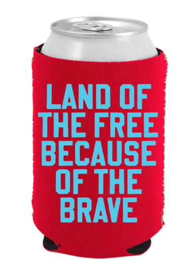 Red can cooler with blue text 'LAND OF THE FREE BECAUSE OF THE BRAVE' on a white background