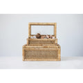 A large rattan storage box with a glass lid, displaying various items inside, placed against a neutral background.
