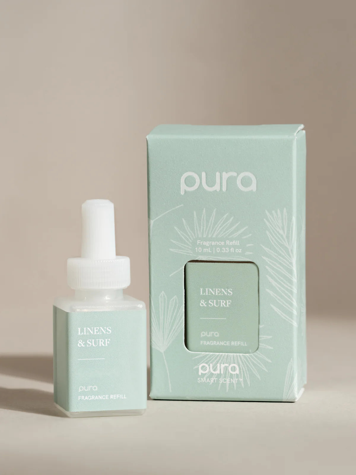Pura scent with notes of bergamot, sea spray, ozonic, pear, passionfruit, orange flower, sandalwood, coconut, and creamy jasmine
