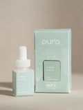 Pura scent with notes of bergamot, sea spray, ozonic, pear, passionfruit, orange flower, sandalwood, coconut, and creamy jasmine