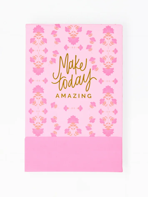 Pink notebook with floral pattern and 'Make today amazing' text on a white background