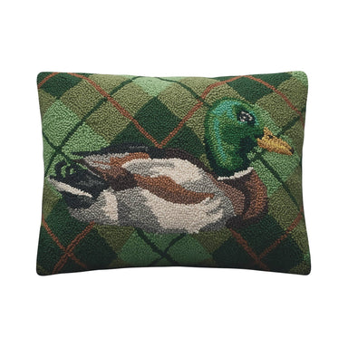 Decorative pillow with a duck design on a green plaid background