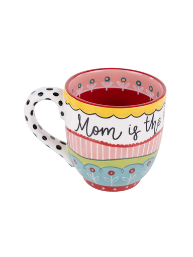 Colorful mug with 'Mom is the heart of the home' text.