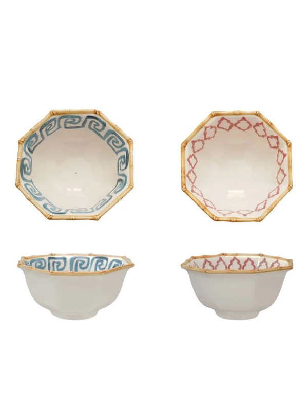 Four octagonal ceramic bowls with decorative patterns on a white background