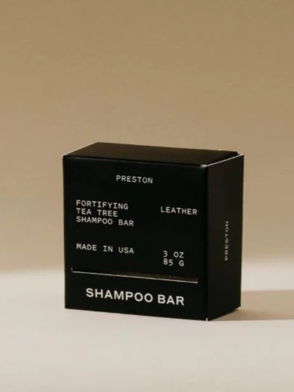 Black box of Preston Shampoo Bar on a beige background