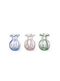 Three small ribbed glass vases in blue, pink, and green, arranged side by side on a white background.