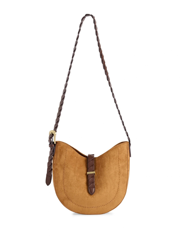 The adjustable cross-body strap features a woven detail for an extra pop of texture, while the magnetic snap closure keeps your essentials secure and easy to access.