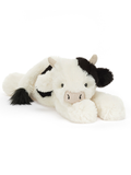 Plush cow jellycat toy with black spots on a white background