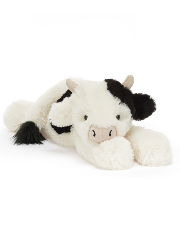 Plush cow jellycat toy with black spots on a white background