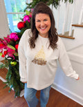 white sweatshirt with a gold sequin tree on the front 