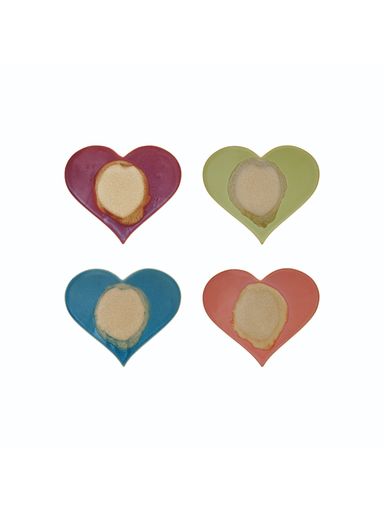 Four heart-shaped trivets