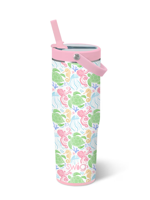Tumbler with sea turtle pattern and pink lid on a white background