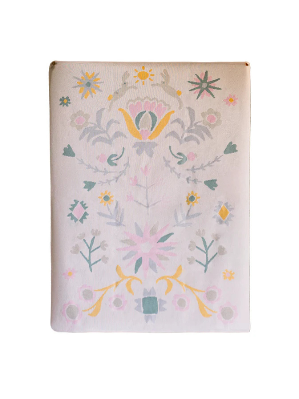 A heirloom pastel lightweight, breathable, and irresistibly soft blanket.