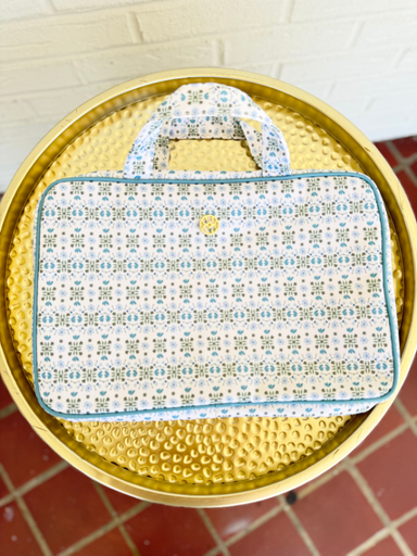 blue and green toiletry bag with handles