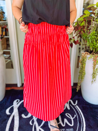 Red and white striped midi skirt with a smocked waistband 