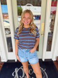 Charcoal short sleeve striped tee with blue and white horizontal stripes and relaxed casual fit.

