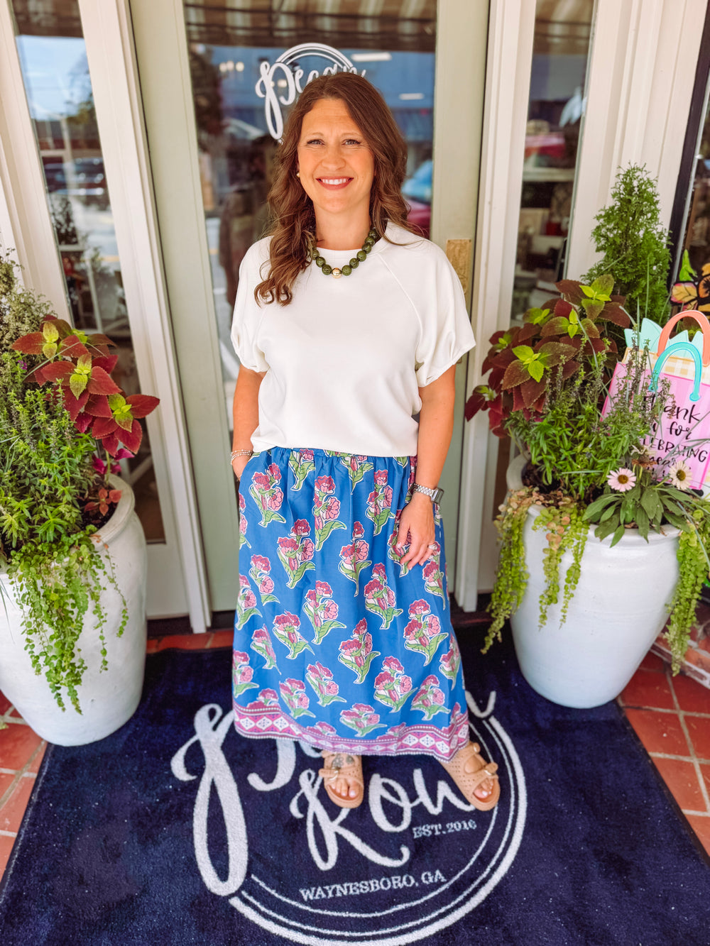 Blue floral print dress with purple and pink color flowers with pockets