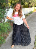 A white graphic T-shirt with red lettering that says "GEORGIA" across the chest