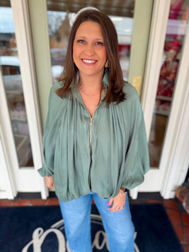 Green gathered hem jacket with gold zipper