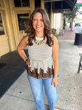 A sleeveless top with horizontal brown and cream stripes, and a brown ruffled hem.