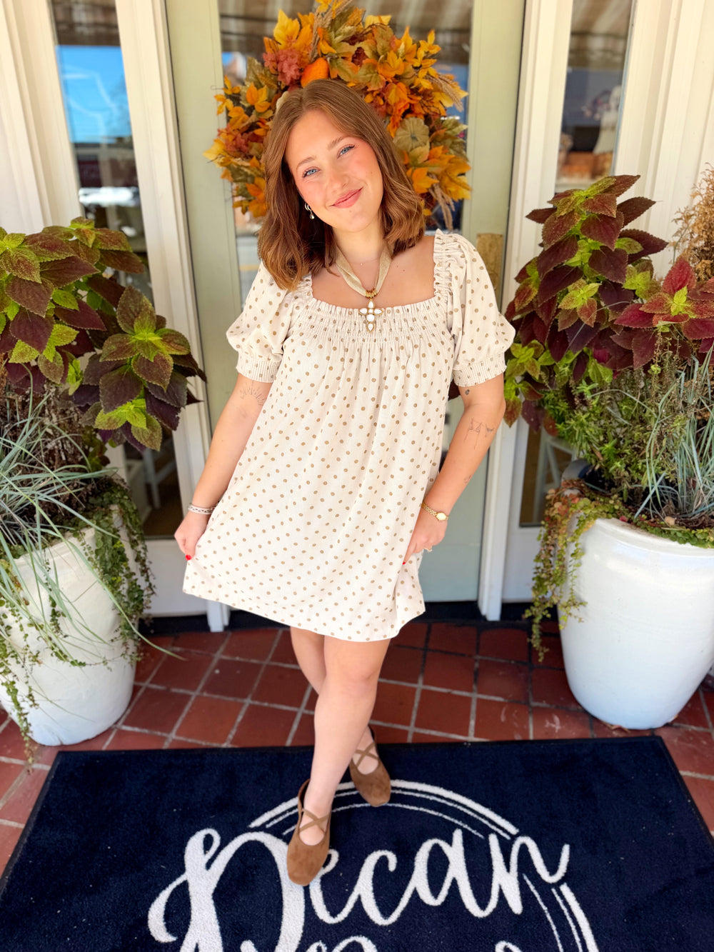  This mini dress features soft corduroy fabric with an allover polka dot print and smocked detailing for a comfortable, flattering fit. 