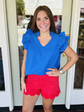 blue ruffle tunic style top