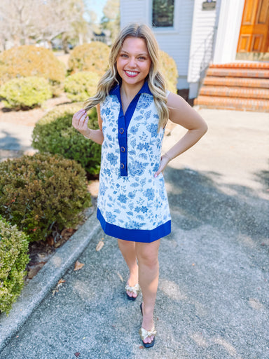 Blue and white floral mini dress with button detailing 