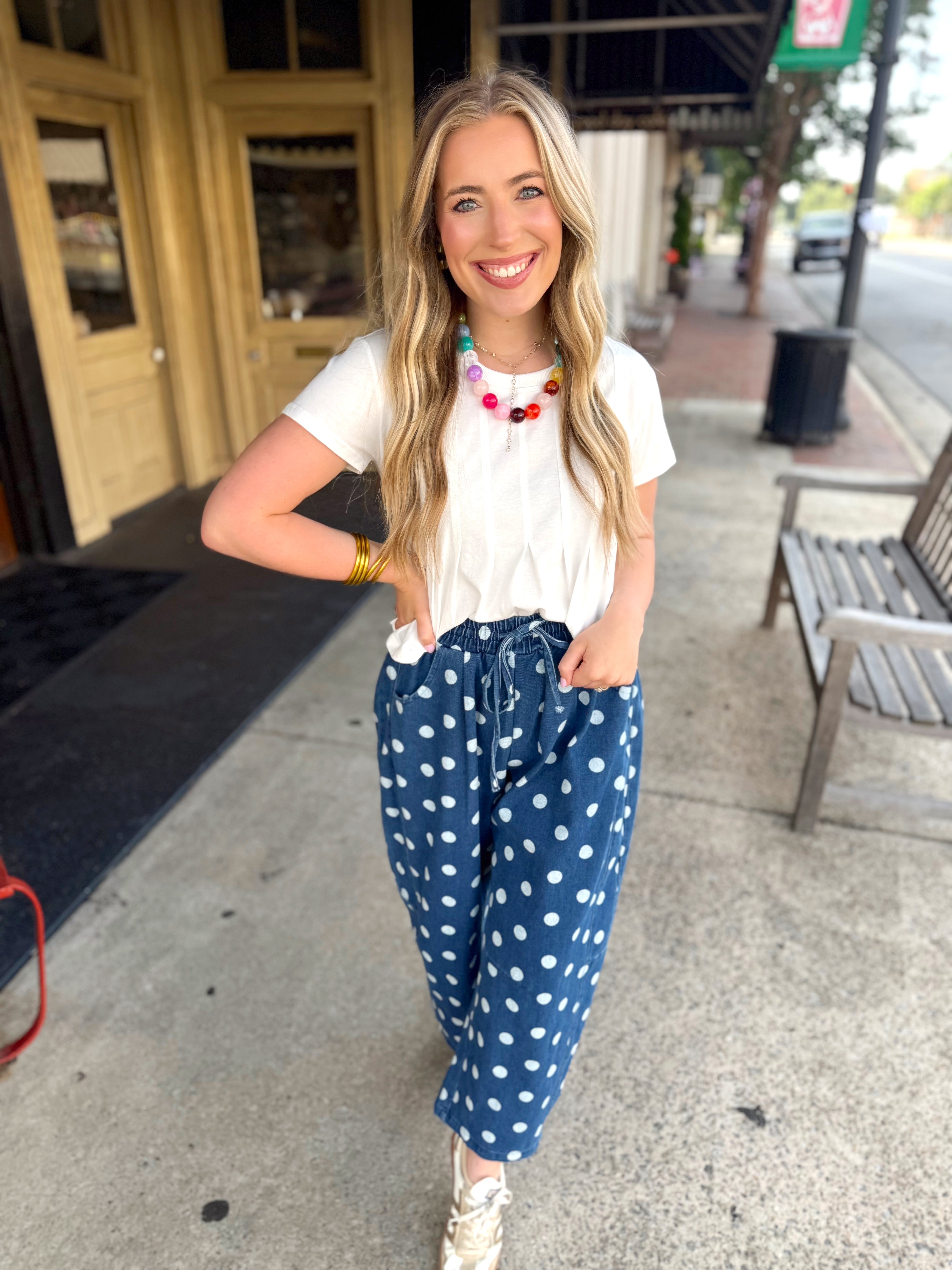 A white pleated swing top 