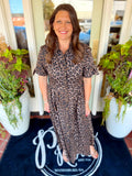 This leopard midi dress features a button-down front, relaxed flowy fit and side pockets.