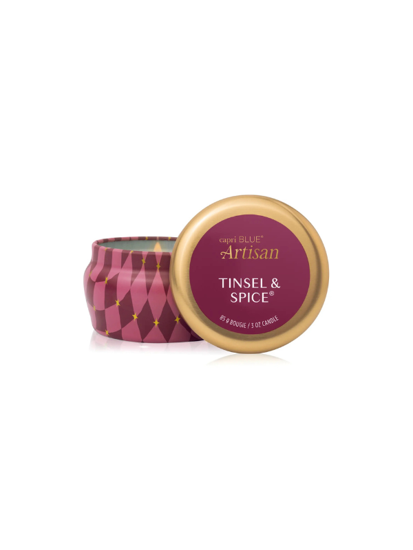 plum color tin with scents of pine and spice