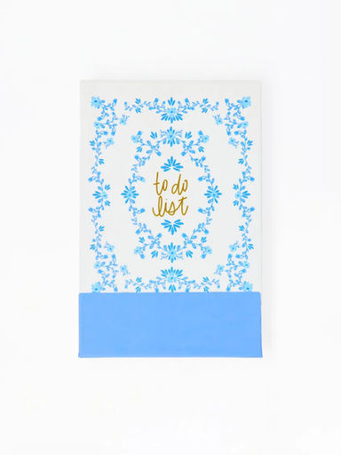 Notebook with floral design and 'to do list' text on a white background